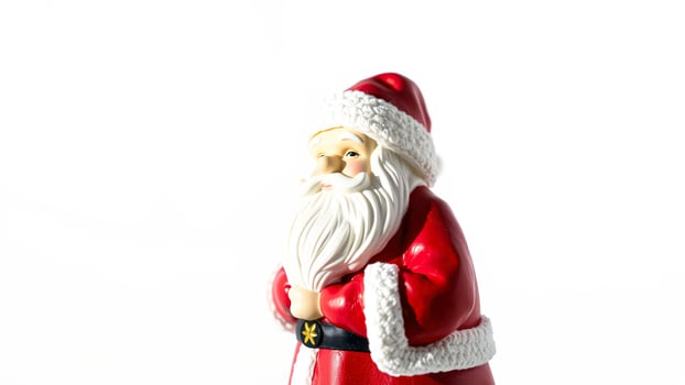 Santa Claus figurine isolated on white background photo