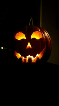 Glowing Jack-o'-Lantern in the Dark photo