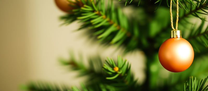 Christmas tree with orange bauble photo