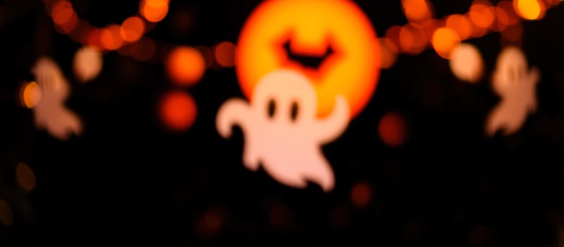 Spooky Halloween Bokeh with Ghost Silhouettes photo