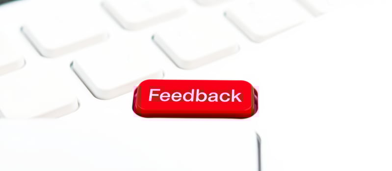 Red Feedback Button On White Keyboard photo