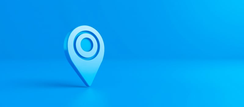 3D Blue Location Pin Icon on Blue Background photo