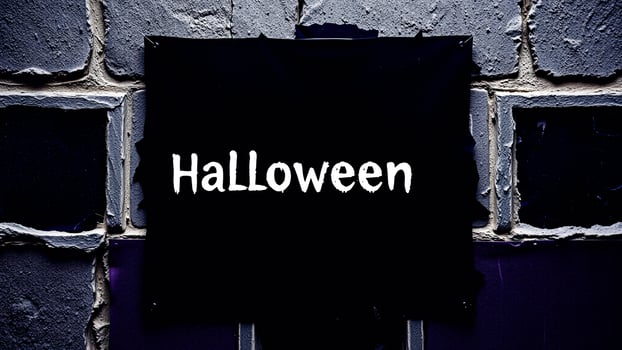 Halloween Sign on Brick Wall photo