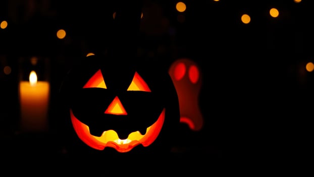Jack-o'-lantern and Ghost in the Dark photo