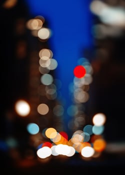 Abstract blurry city lights at night photo