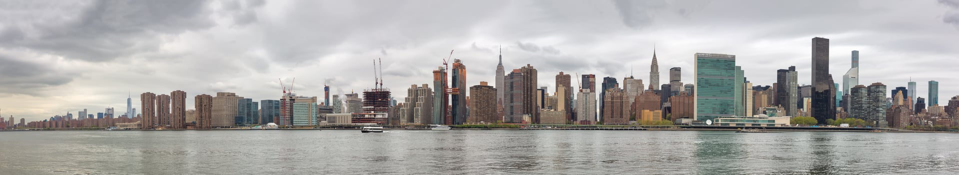 A city skyline with many tall buildings in the background photo