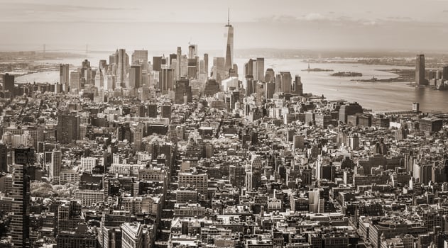 A black and white photo of a city skyline