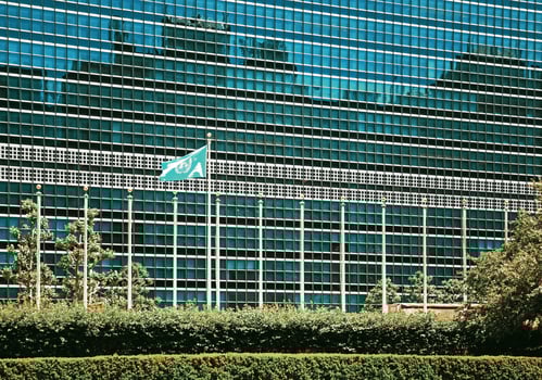 A large building with a large flag on top of it photo