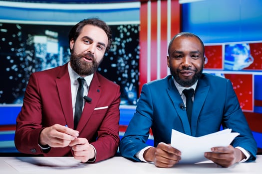Diverse journalists live on talk show, broadcasting latest breaking news with exclusive details and information. Team of presenters discussing international events, covering all topics on tv network. photo