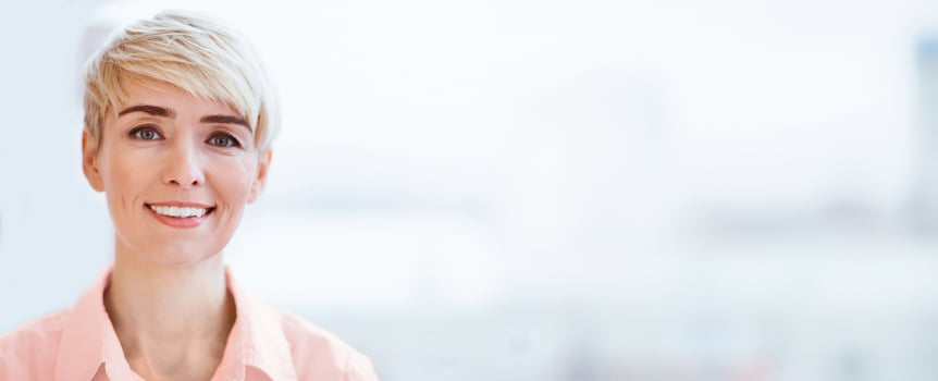 Businesswoman's Portrait. Cheerful Female Entrepreneur Smiling At Camera Posing Near Window Indoor. Free Space, Selective Focus photo