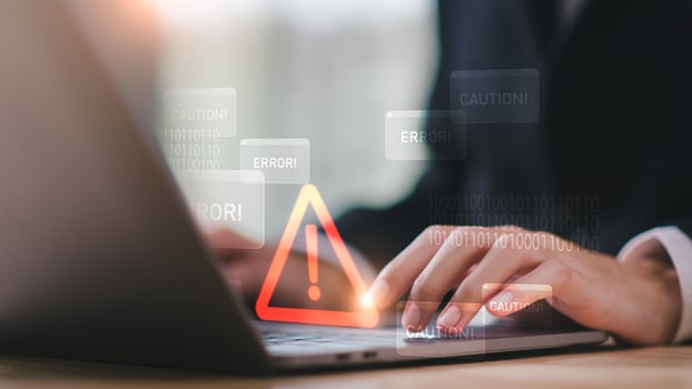 Programmer and virtual icons , exclamation mark ,alarm,computer virus detected ,danger warning concept or information error that should be urgently fixed and repaired ,Notification of security issues photo