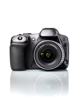 digital camera isolated on white background photo