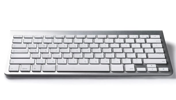 computer keyboard isolated on white background photo