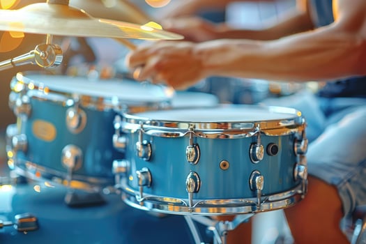 A person is playing a drum set photo