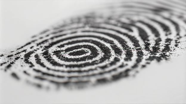 A fingerprint is shown on a white surface photo