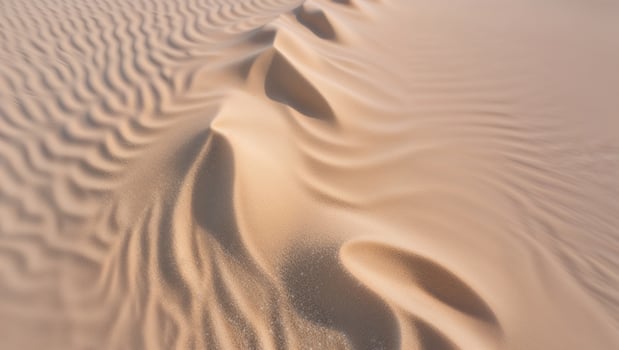 Sand dunes in the desert with ripples in the sand photo