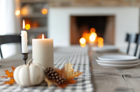 Candles and Pumpkin on Table With Fireplace photo