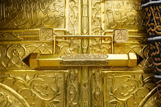 Detailed replica of the Kaaba door with calligraphy. photo