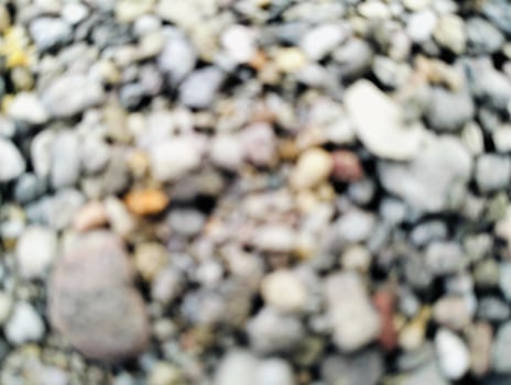 Close up of pebbles and rocks with blurry background, Natural stones background, wallpaper out of focus. photo