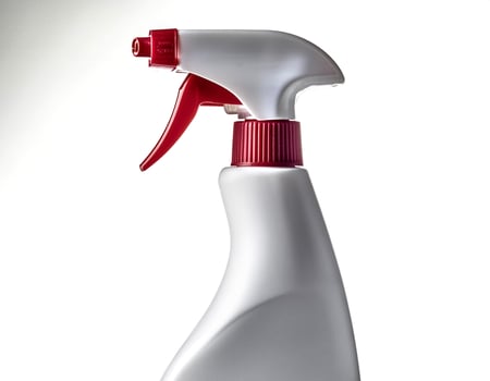 cleaning spray bottle isolated on white background photo