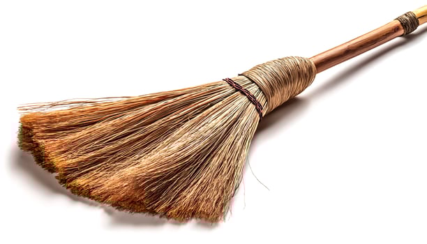 a broom isolated on white background photo