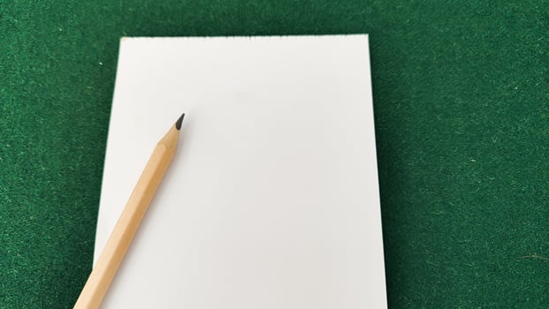 pencil and notebook on the table photo