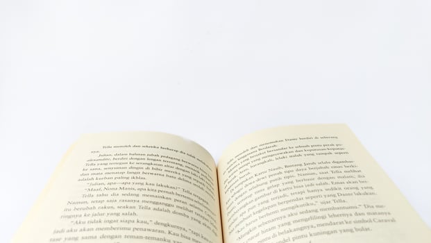 stack of colorful books on white background, open book, stack of books isolated on background, education, read, study, school, library, dictionary. photo