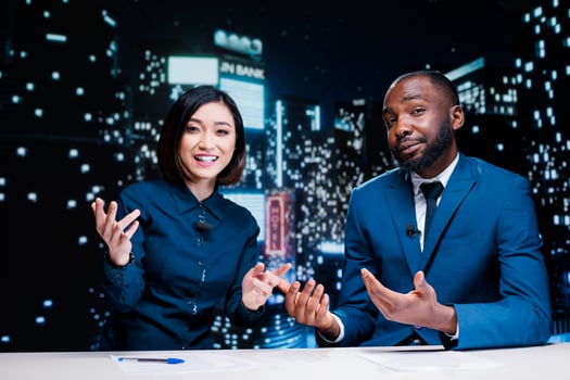 Team of newscasters on night tv show transmitting live information from media outlets and newspapers, global communications. Diverse reporters working on television network content. photo