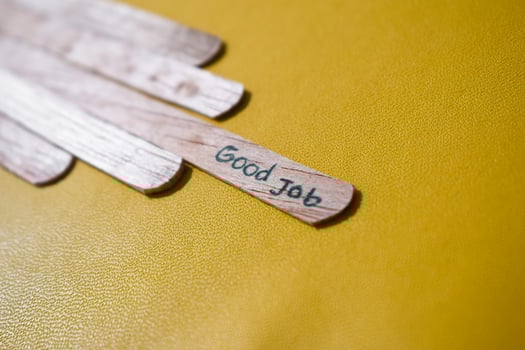 stick of ice cream with the words Good Job. Motivational quotes, optimism, positive words. Isolated on background photo