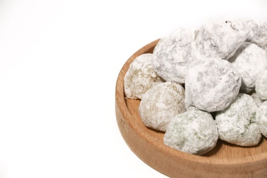 Mochi - trendy and sweet dessert, Mochi cake on a plate on a white background. photo