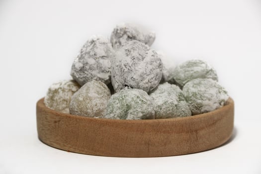 Mochi - trendy and sweet dessert, Mochi cake on a plate on a white background. photo