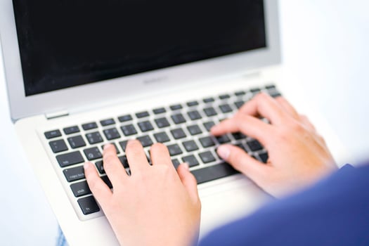 Closeup and crop hands of human typing work on laptop keyboard. photo
