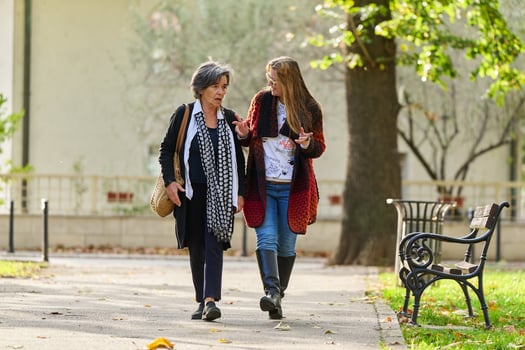 Autumn Walk. A Mother and Daughter Share Love and Support in Natures Embrace. photo