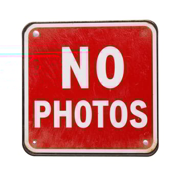 No Photos Prohibitory Sign on White Background