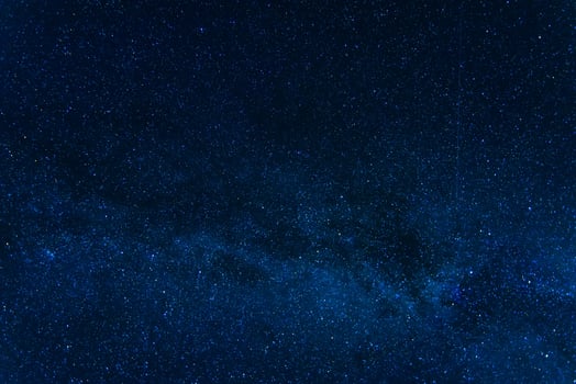 blue starry night sky with milky way and galaxies. Astrophotography with stars and constellations photo