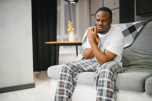 Portrait of African Man having Toothache, Tooth infection photo