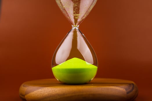 Hourglass with running out of time Concept of time and life Work with time as a deadline photo