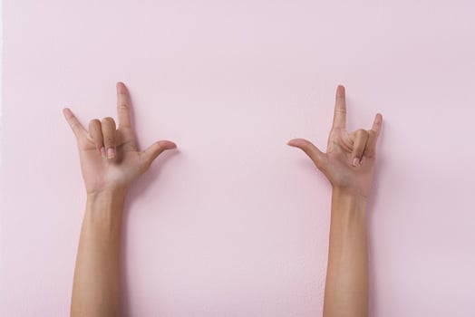 Two hands making Rock U in the air photo