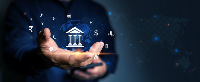 Online banking interbank payment concept. Businessman with virtual global currency symbols in hand. photo