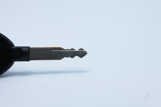 motorcycle ignition key isolated on white background photo