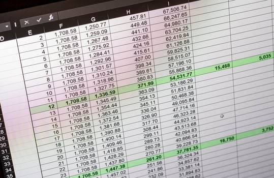 Shot of an dark mode excel sheet on computer screen showing bank loan amortization table. Banking photo