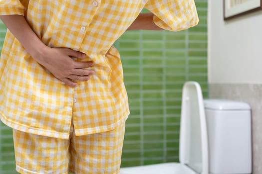 Constipation and diarrhea in bathroom. Hurt woman touch belly stomach ache painful. colon inflammation problem, toxic food, abdominal pain, abdomen, constipated in toilet, stomachache, Hygiene photo
