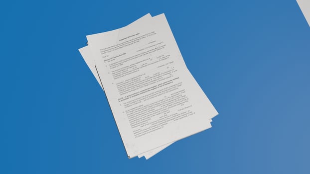 Examination Paper Stack with blue background photo