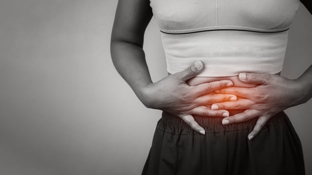 Woman hands on stomach painful suffering from stomachache, Symptom of sickness. Stress, Menstruation, Diarrhea, Digestive problem, Cervical cancer, Cramp, Stomach Ache, Unhealthy diet, Gastritis. photo