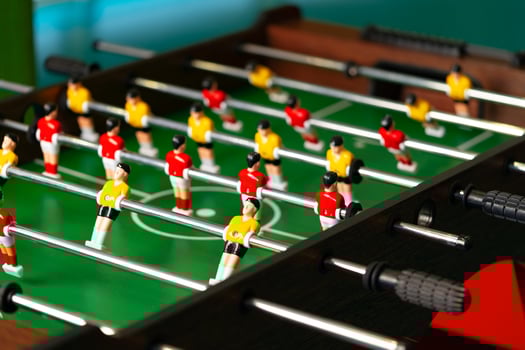 Close Up of a Foosball Table With Foosball Players photo