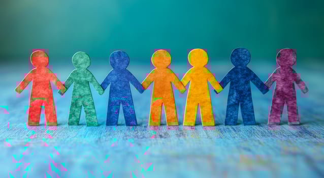 A group of people holding hands in a rainbow line. Concept of unity and inclusivity photo
