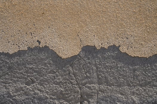Texture of white plaster on a concrete wall handmade. Construction, interior design photo