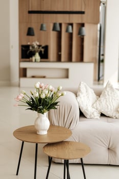 Pink and white tulips bringing freshness to modern living room photo