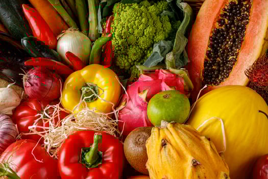 A Rich and Abundant Collection of Fresh Vegetables Nestled Together with Fresh Fruits photo