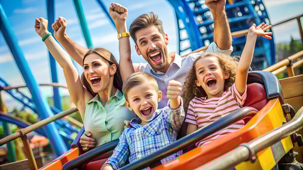 Family having fun on roller coaster photo